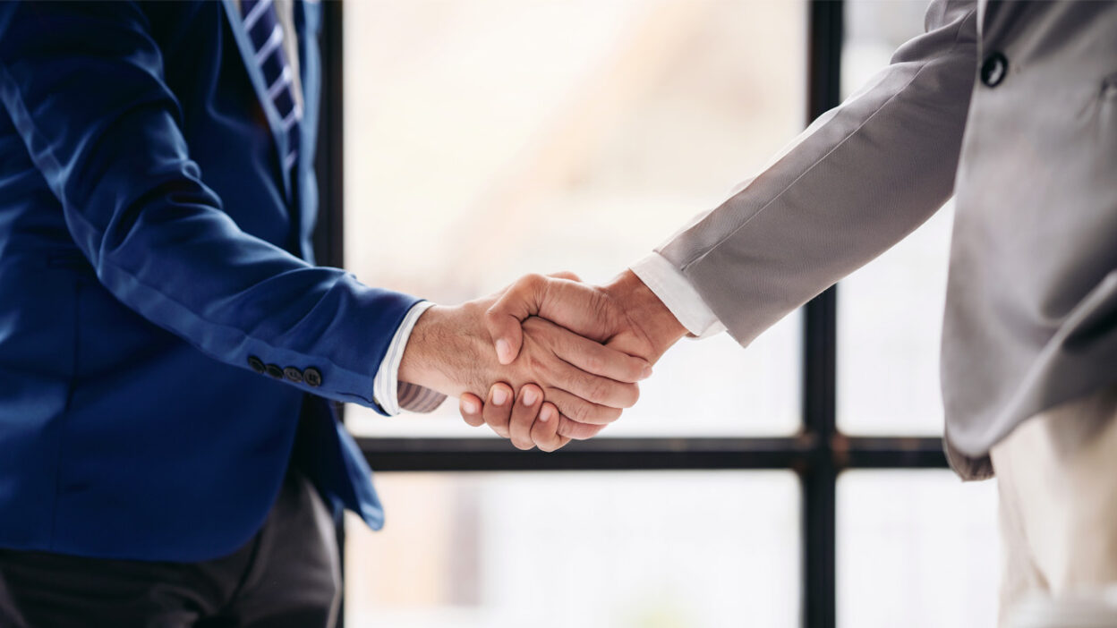 Business men shaking hands